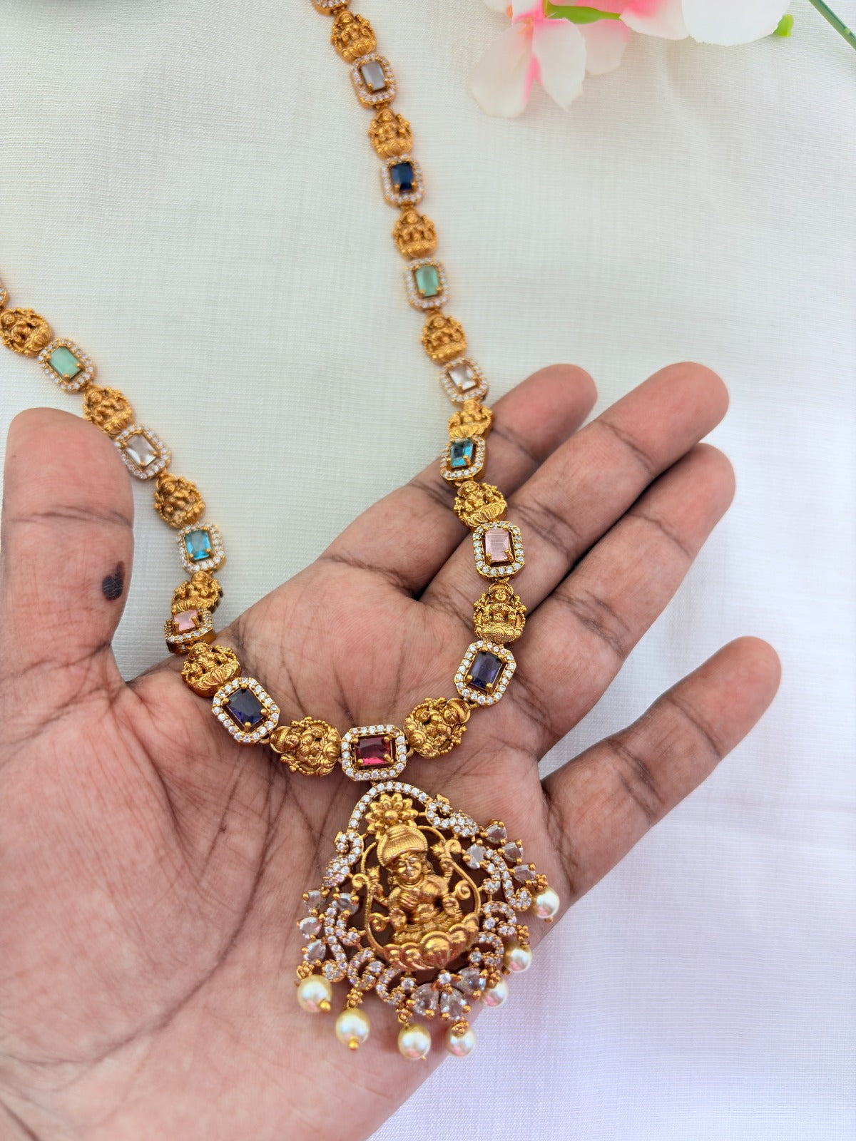 Temple jewellery - Premium matte finish Lakshmi pendant haram with stones and pearl drops