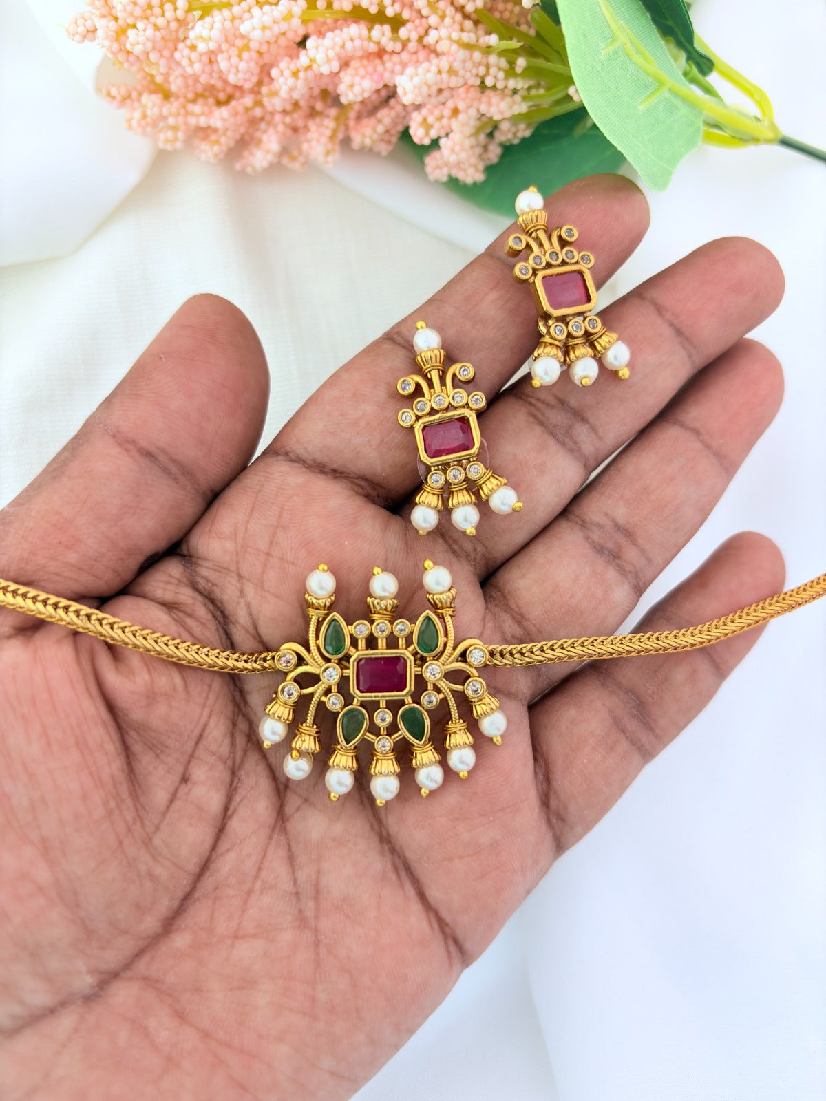 Traditional pattern  premium matte finish necklace and matching earrings crafted with stones and pearls