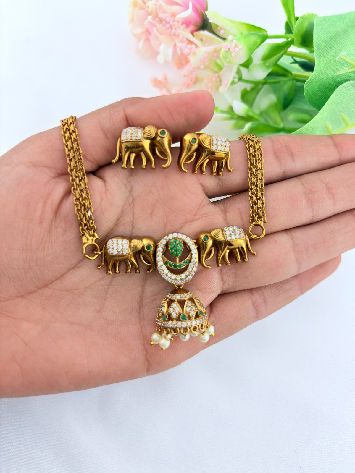 Premium matte finish Elephant motif necklace adorned with pearl drops