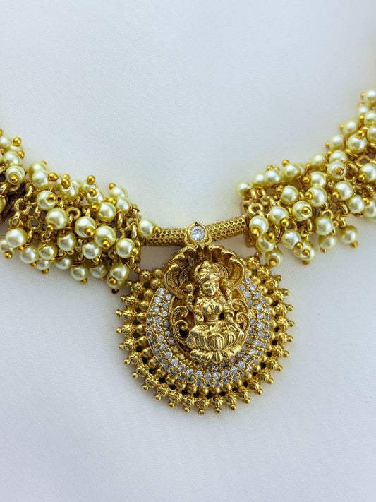 Premium matte finish Temple-inspired necklace adorned with elegant pearl drops