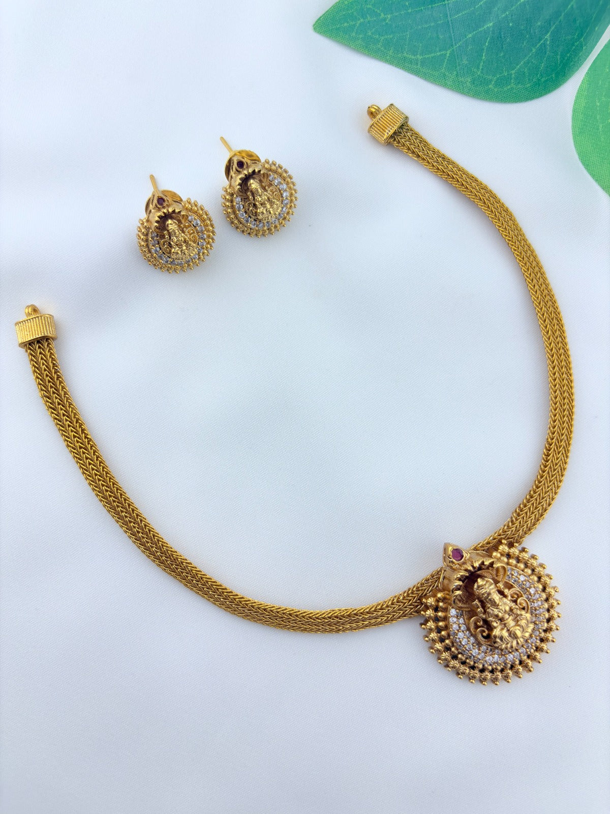 Temple inspired AD stone premium matte finish lakshmi choker set with matching earrings