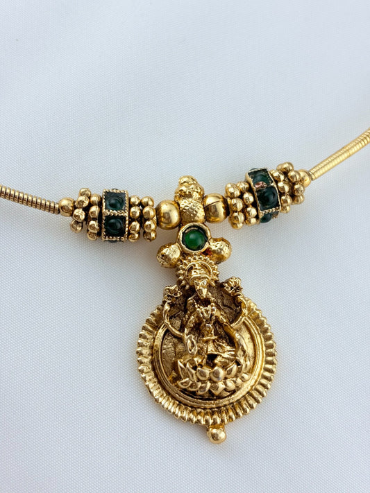 Temple inspired design matte finish laskhmi choker with earrings