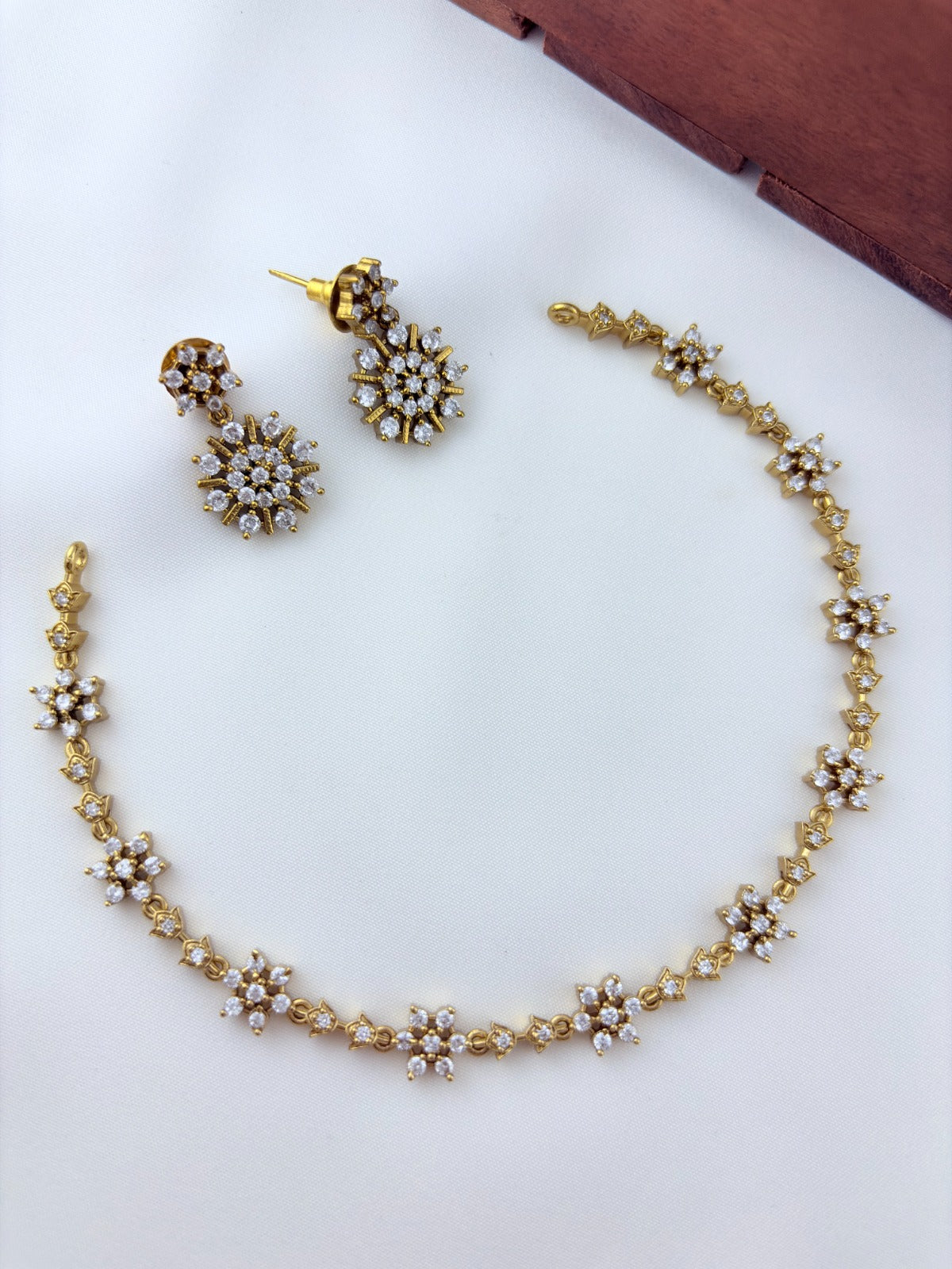 Elegant design with timeless charm premium matte finish AD necklace with earrings