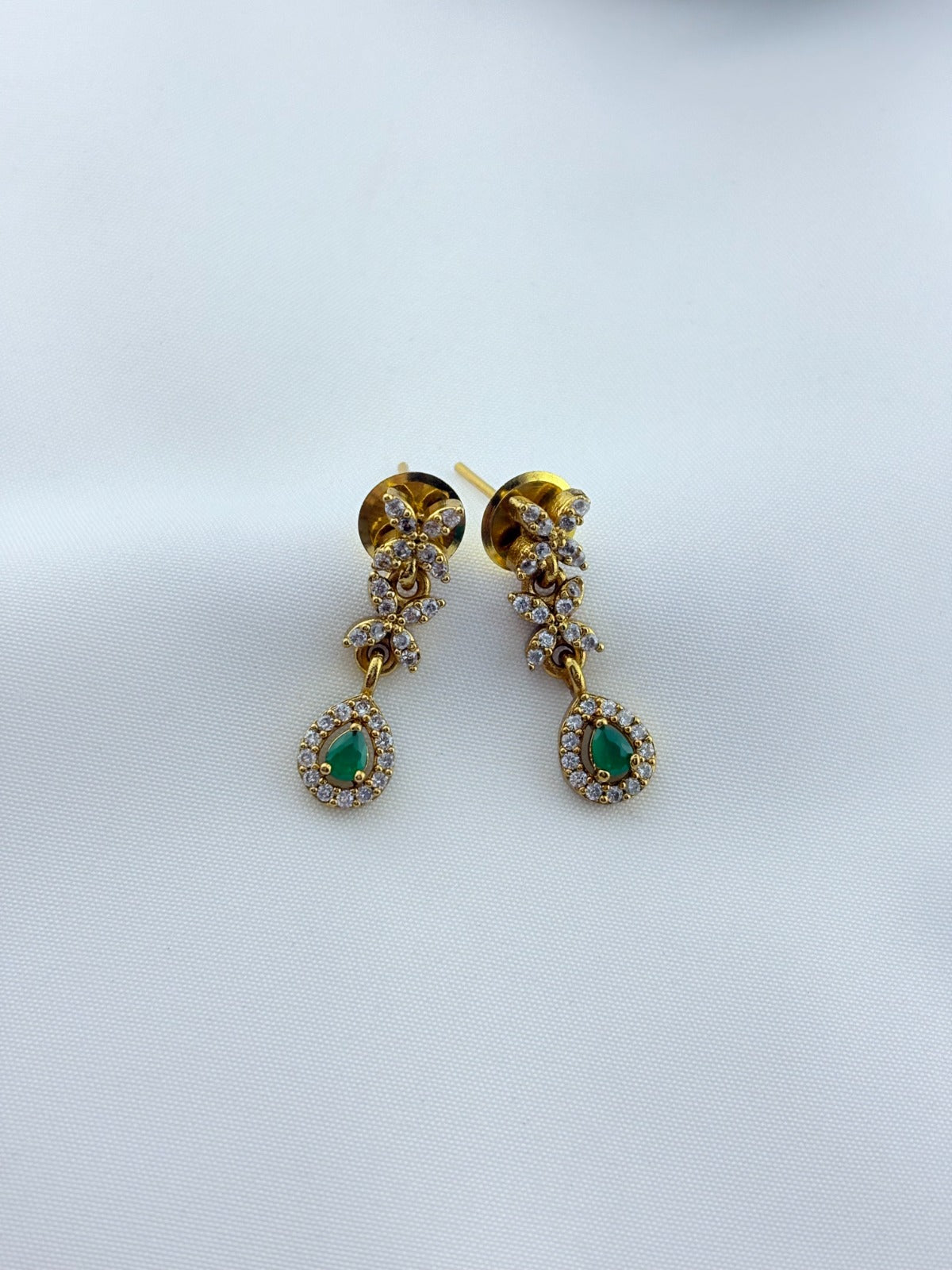 Trendy design Premium matte finish AD necklace and earrings adorned with classic stone drops