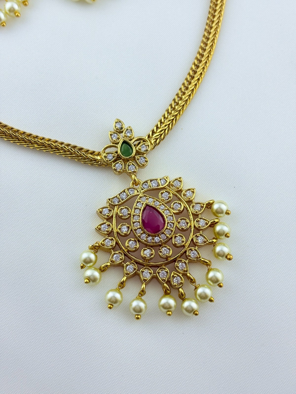 Premium matte finish neckset with classic pendant and matching earrings