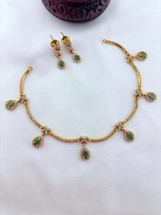 Trendy design Premium matte finish AD necklace and earrings adorned with classic stone drops