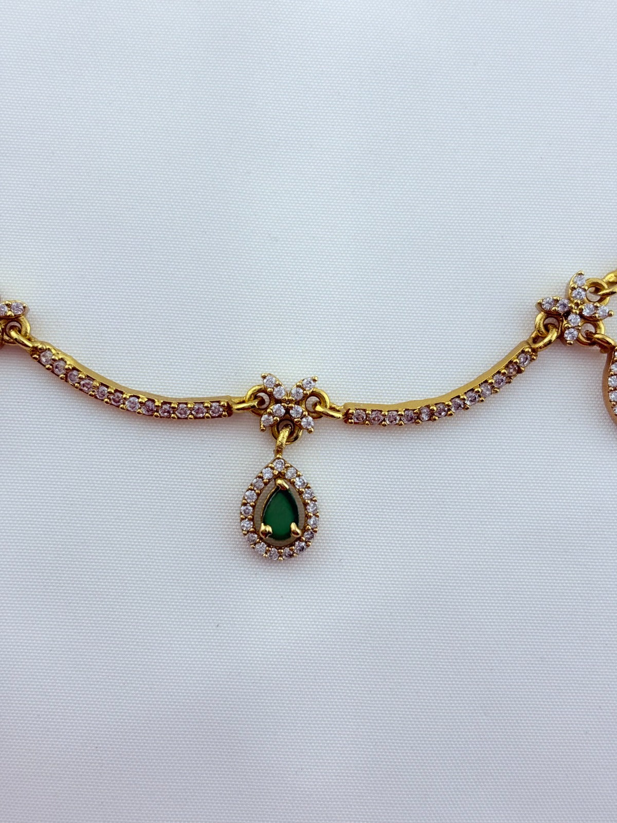 Trendy design Premium matte finish AD necklace and earrings adorned with classic stone drops