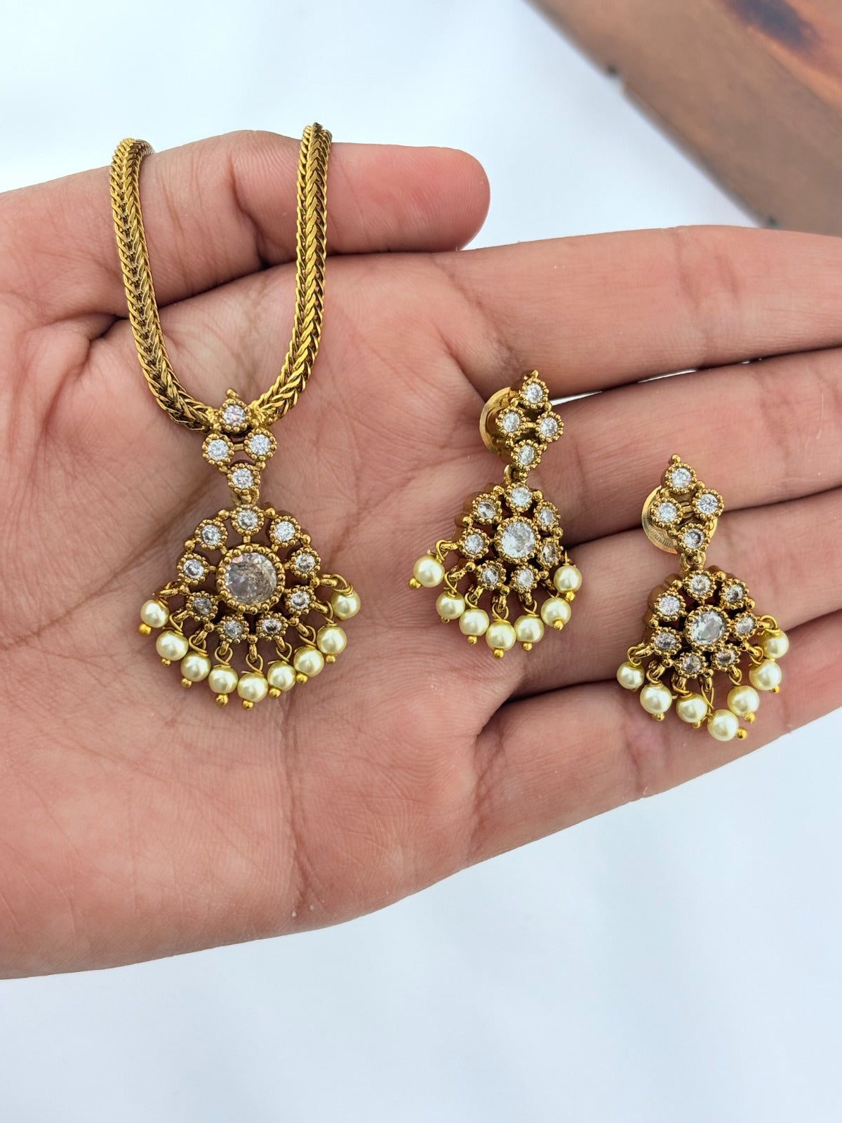 Beautiful design matte finish neckset and matching earrings with pearl drops