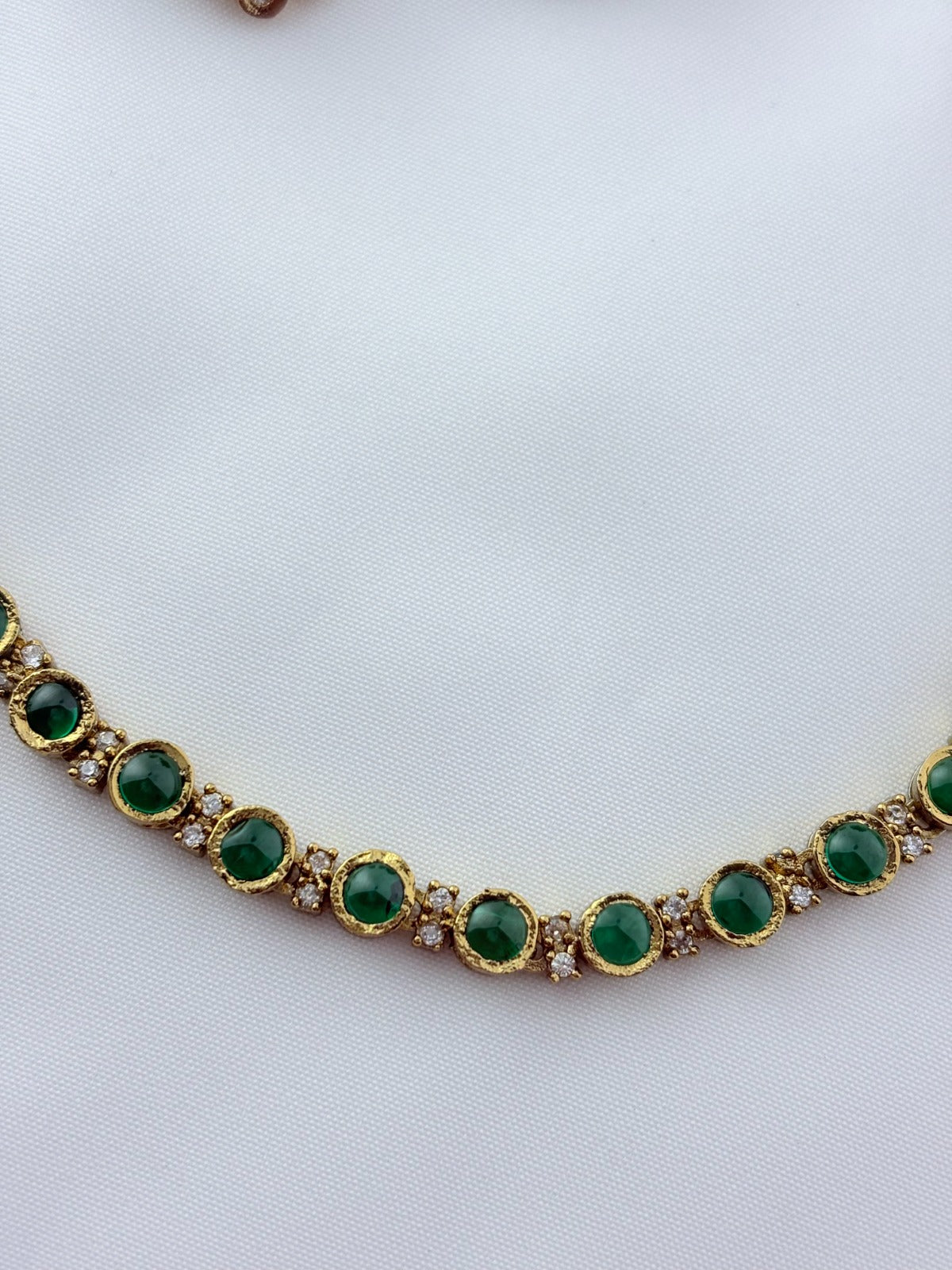 Classic traditional motifs with a trendy touch - Premium matte finish AD stone necklace with matching studs