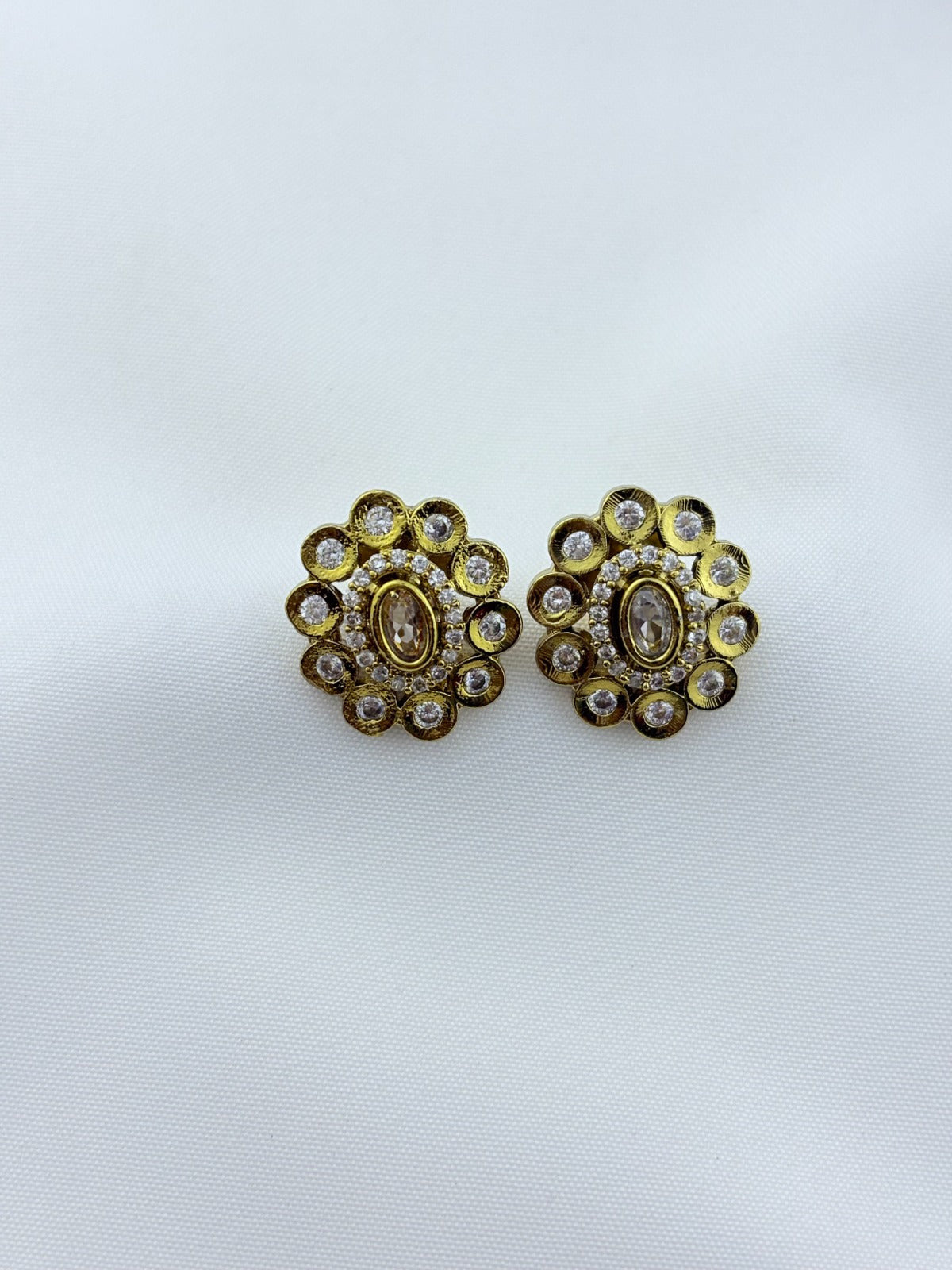 Classic traditional motifs with a trendy touch - Premium matte finish AD stone necklace with matching studs