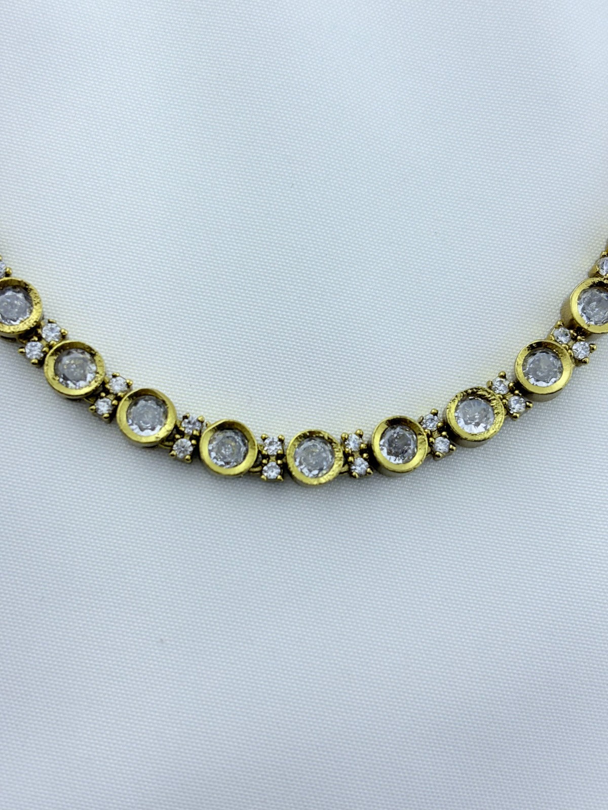 Classic traditional motifs with a trendy touch - Premium matte finish AD stone necklace with matching studs