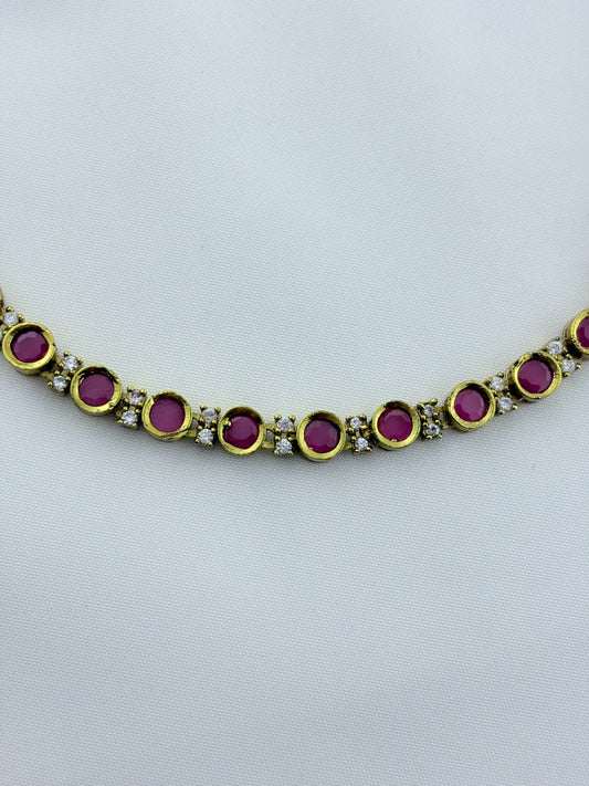 Classic traditional motifs with a trendy touch - Premium matte finish AD stone necklace with matching studs