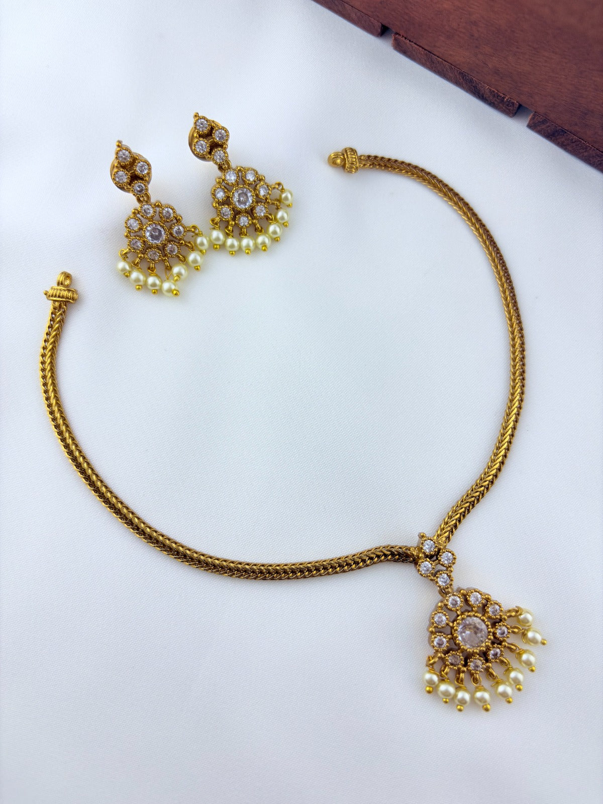 Beautiful design matte finish neckset and matching earrings with pearl drops