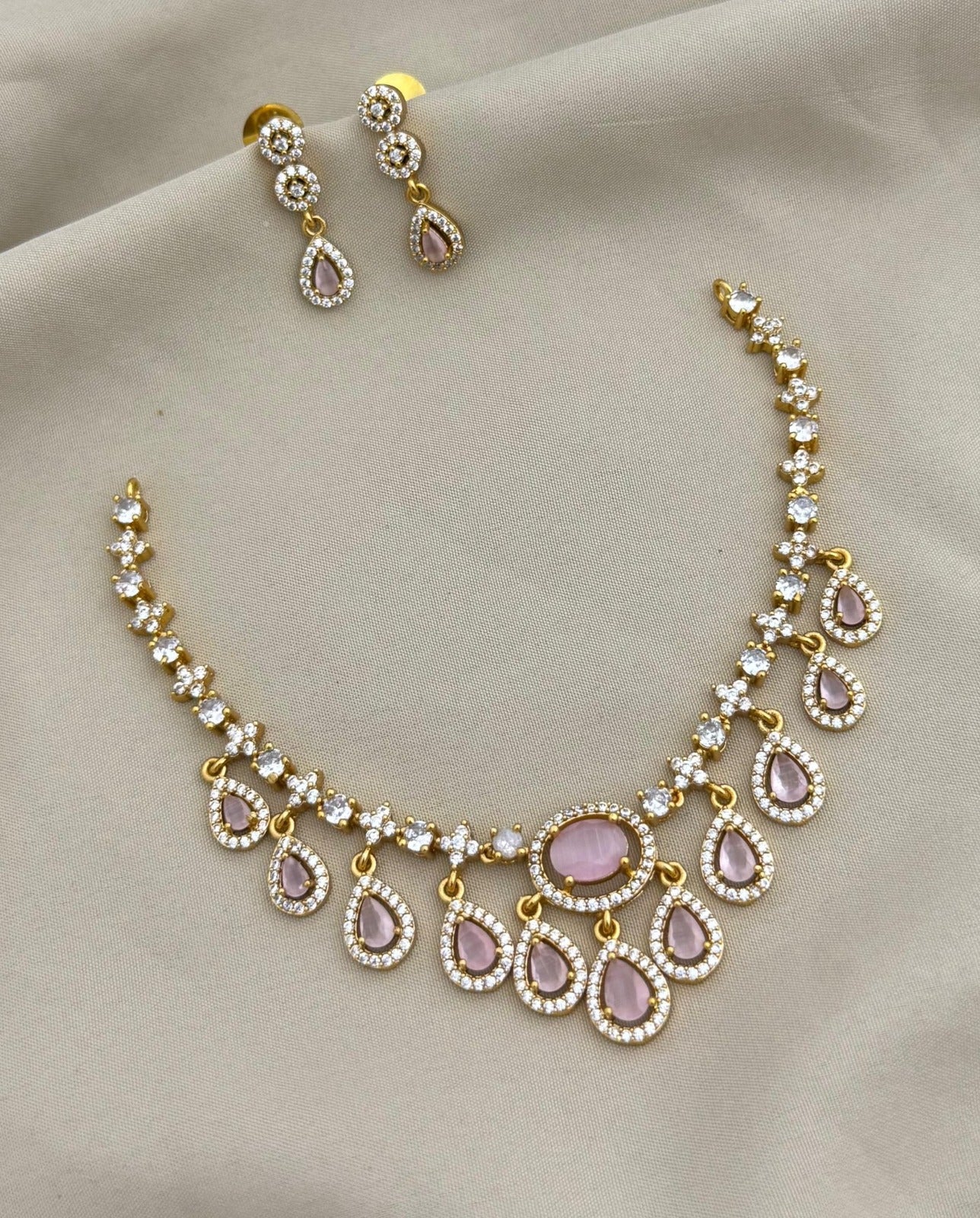 Minimal design with a premium finish necklace with matching earrings