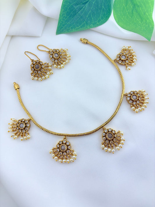 Premium matte finish necklace and matching earrings  crafted with kemp pendant adorned with pearl drops