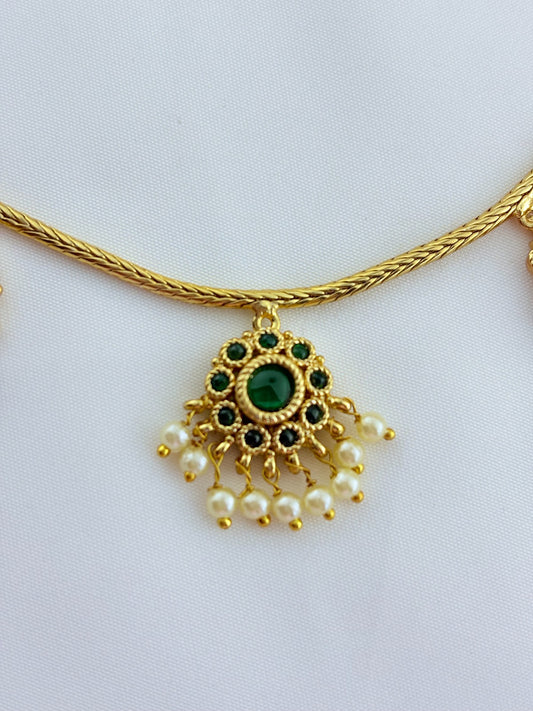 Premium matte finish necklace and matching earrings  crafted with kemp pendant adorned with pearl drops