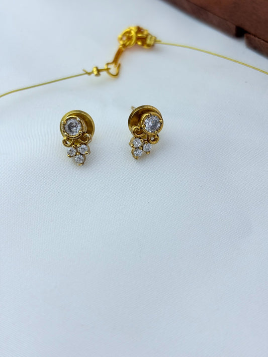 Premium invisible chain and matching earrings adorned with AD stone drops