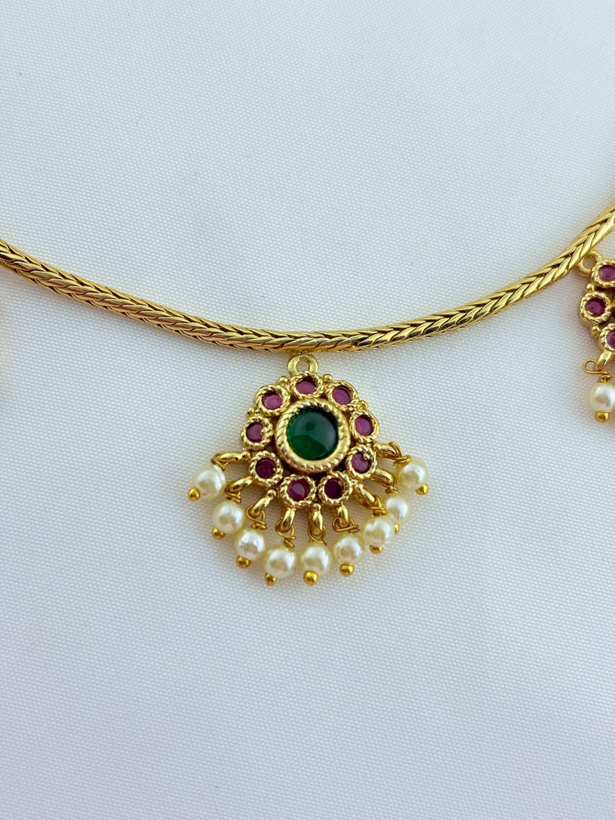 Premium matte finish necklace and matching earrings  crafted with kemp pendant adorned with pearl drops