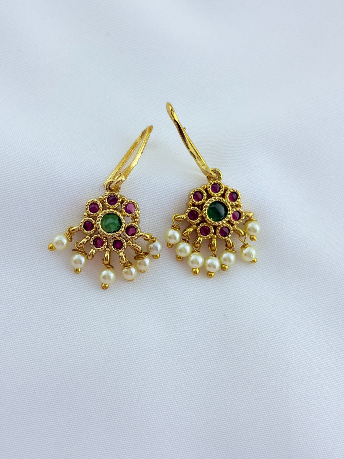 Premium matte finish necklace and matching earrings  crafted with kemp pendant adorned with pearl drops