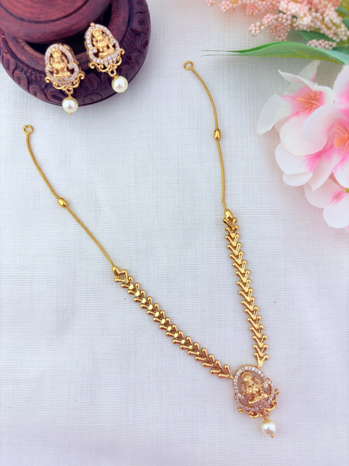 Temple jewellery - Premium matte finish AD Lakshmi pendant chain with matching earrings