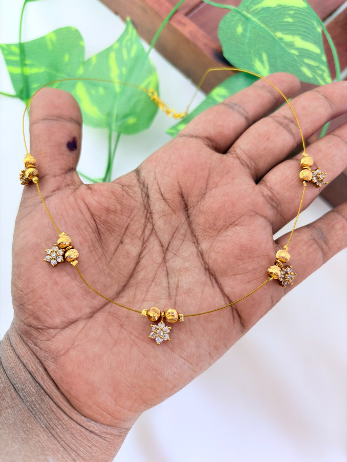 Premium invisible chain  adorned with AD stone drops