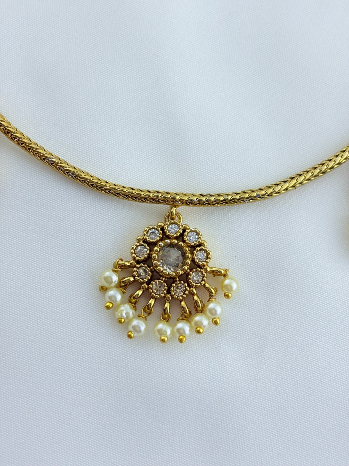 Premium matte finish necklace and matching earrings  crafted with kemp pendant adorned with pearl drops