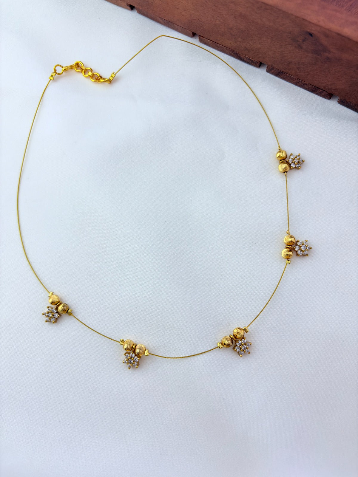 Premium invisible chain  adorned with AD stone drops