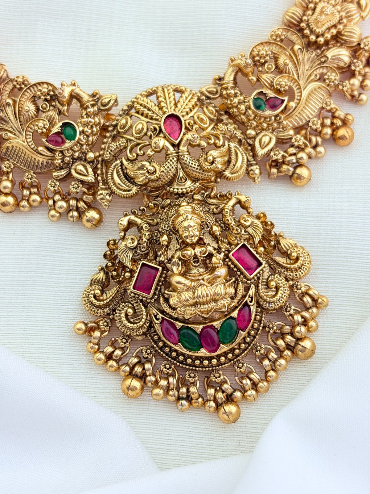 Traditional matte finish lakshmi necklace wtih golden bead detailing and matching jhumka