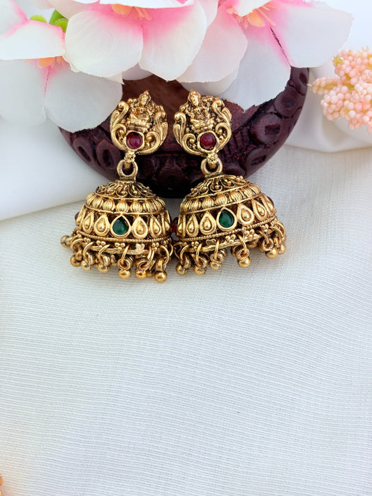 Traditional matte finish lakshmi necklace wtih golden bead detailing and matching jhumka