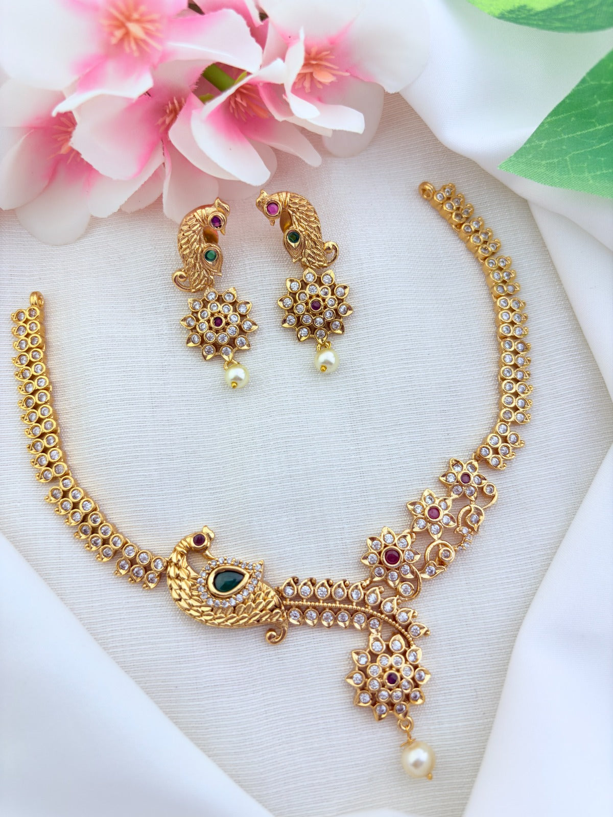 Classic peacock and floral pattern necklace in premium matte finish with pearl drops