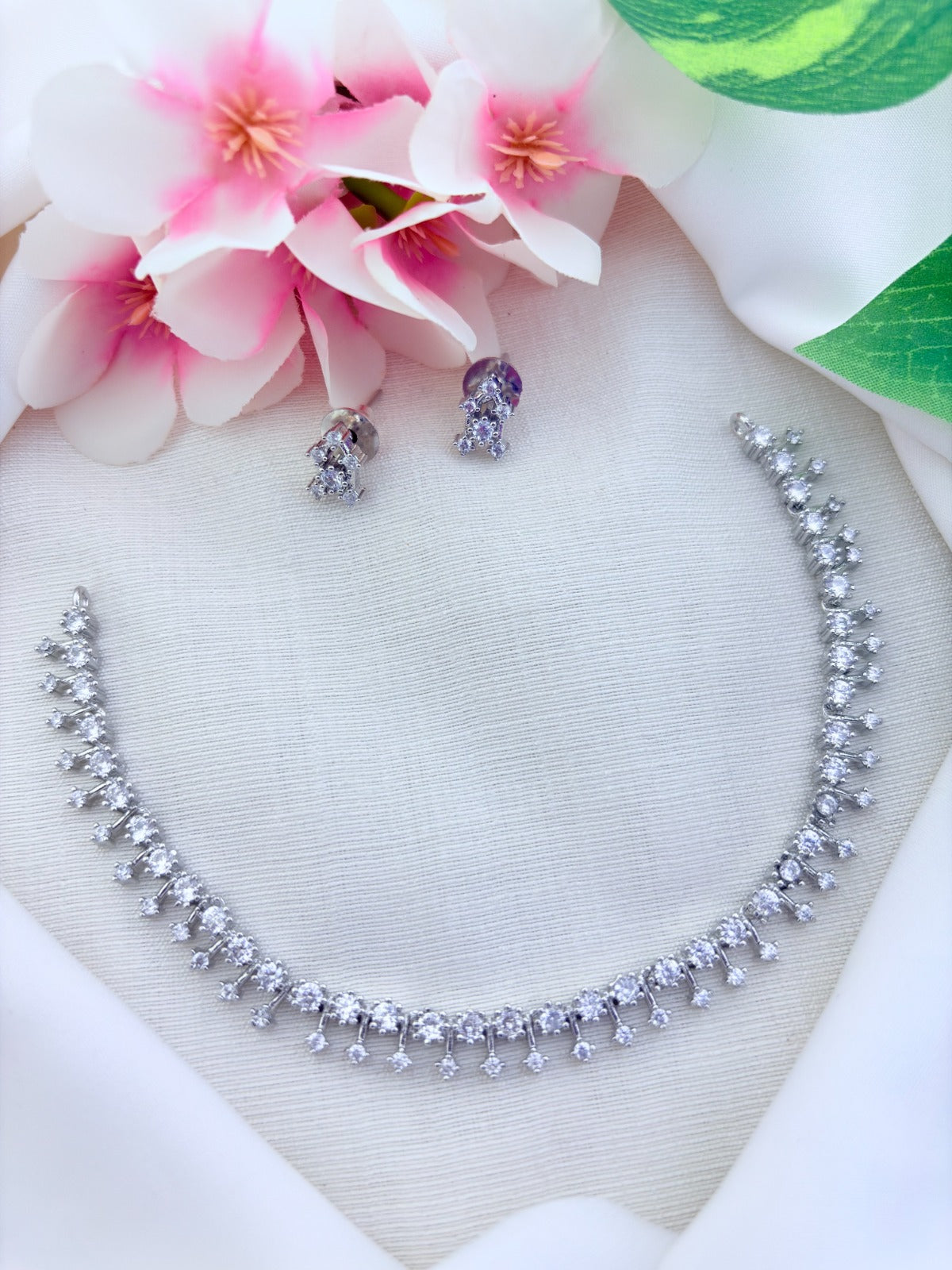 Premium silver polish AD stone vaishu inspired set with matching earrings