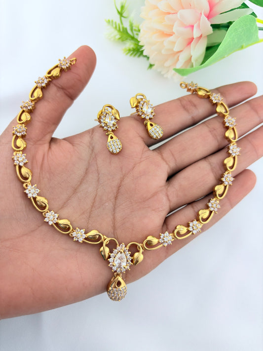 Elegant AD stone necklace in premium matte finish with matching earrings