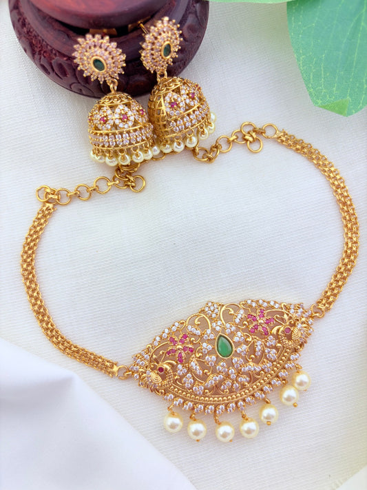 Elegant premium matte finish choker and matching jhumka beautifully crafted with AD stones and pearl drops