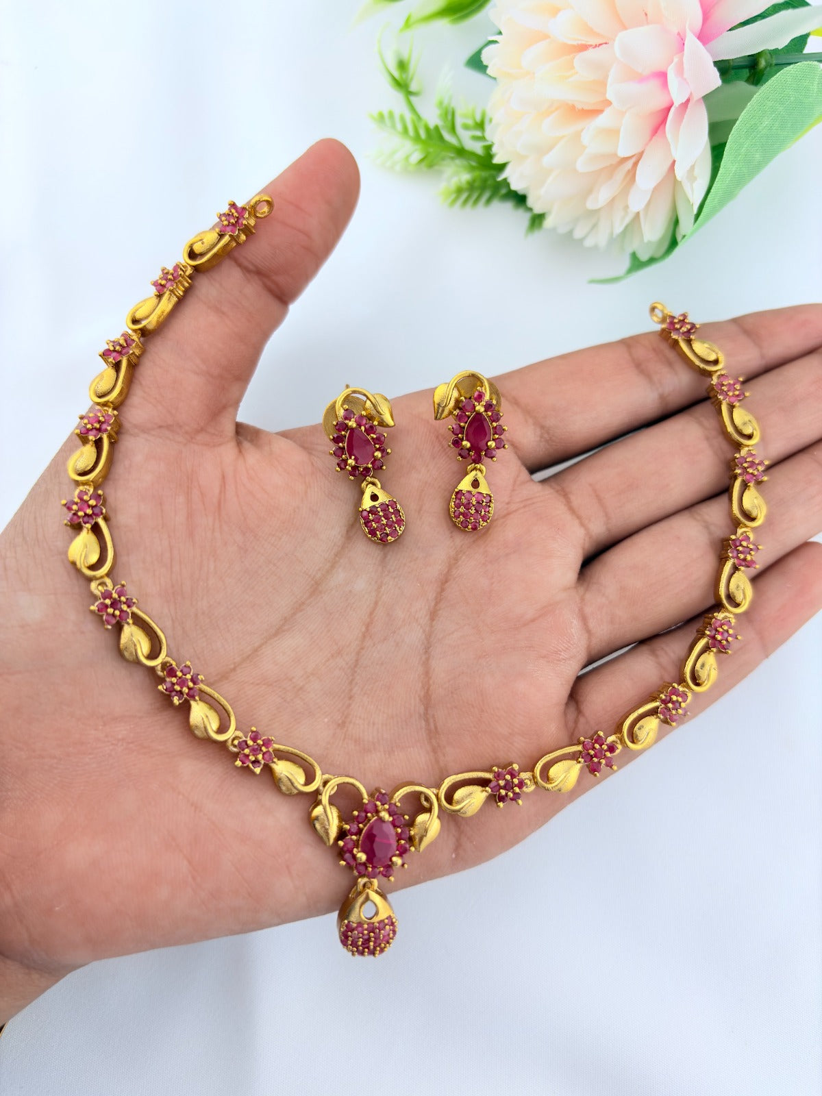 Elegant AD stone necklace in premium matte finish with matching earrings