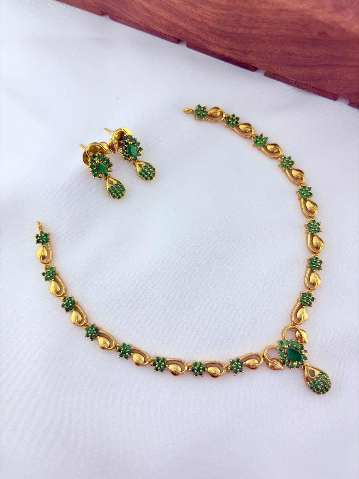 Elegant AD stone necklace in premium matte finish with matching earrings