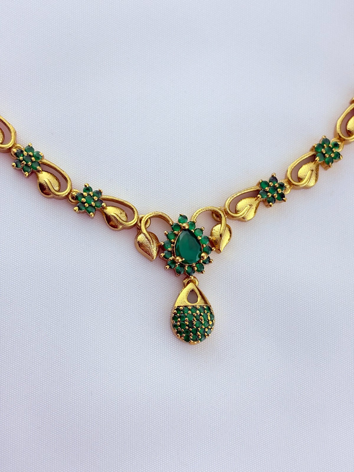 Elegant AD stone necklace in premium matte finish with matching earrings