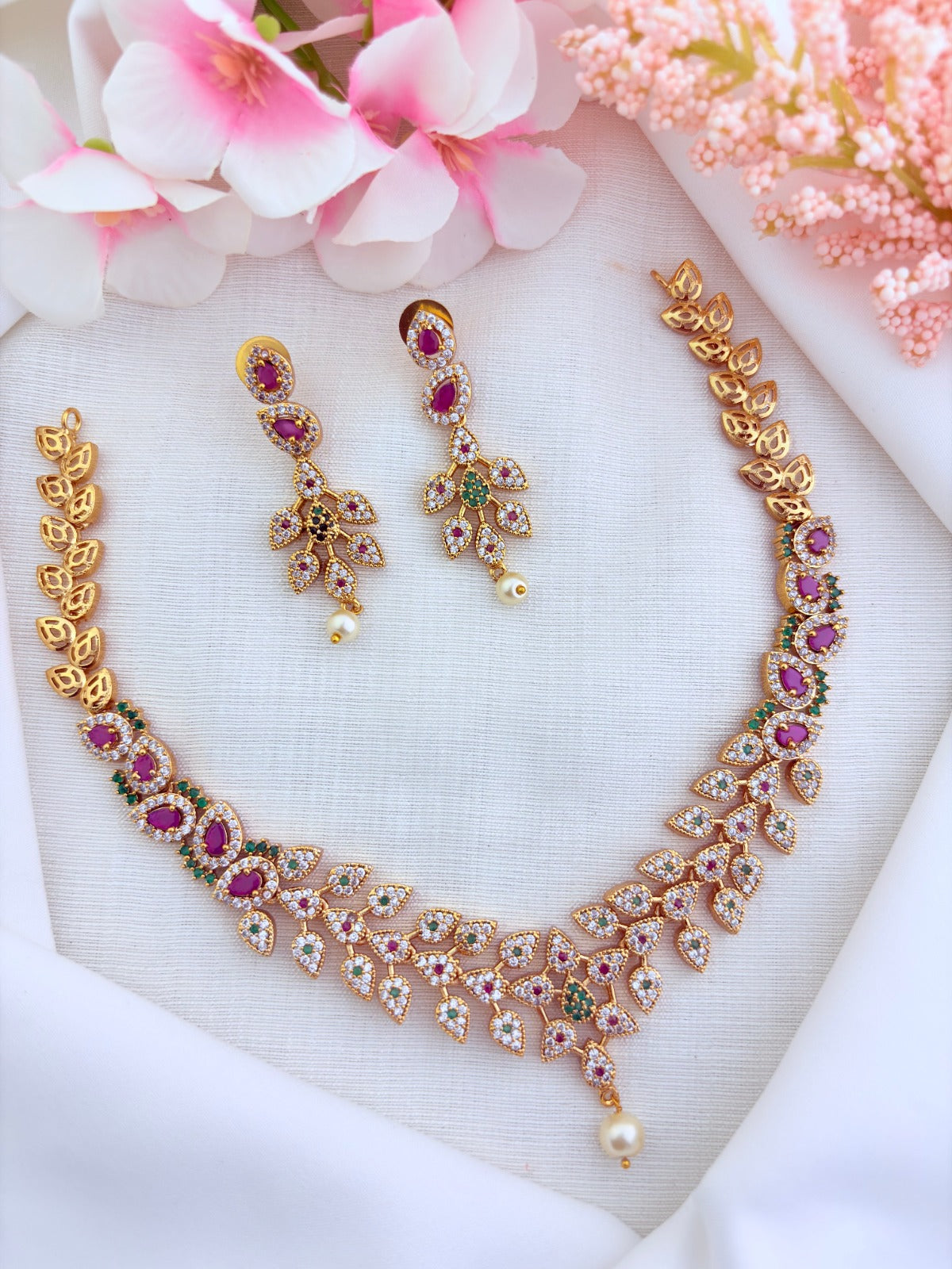 Elegant leaf pattern necklace in premium matte finish adorned with classic AD stones