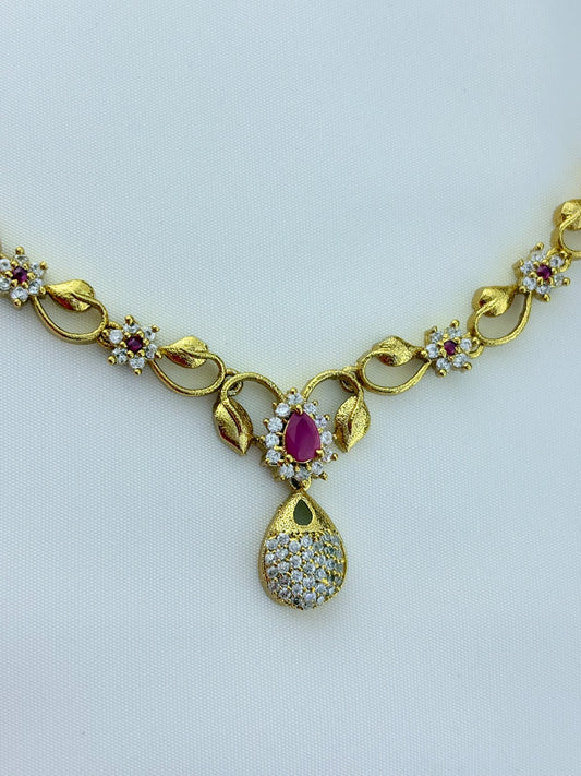 Elegant AD stone necklace in premium matte finish with matching earrings