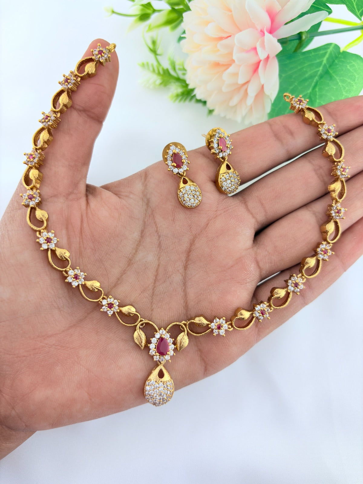 Elegant AD stone necklace in premium matte finish with matching earrings