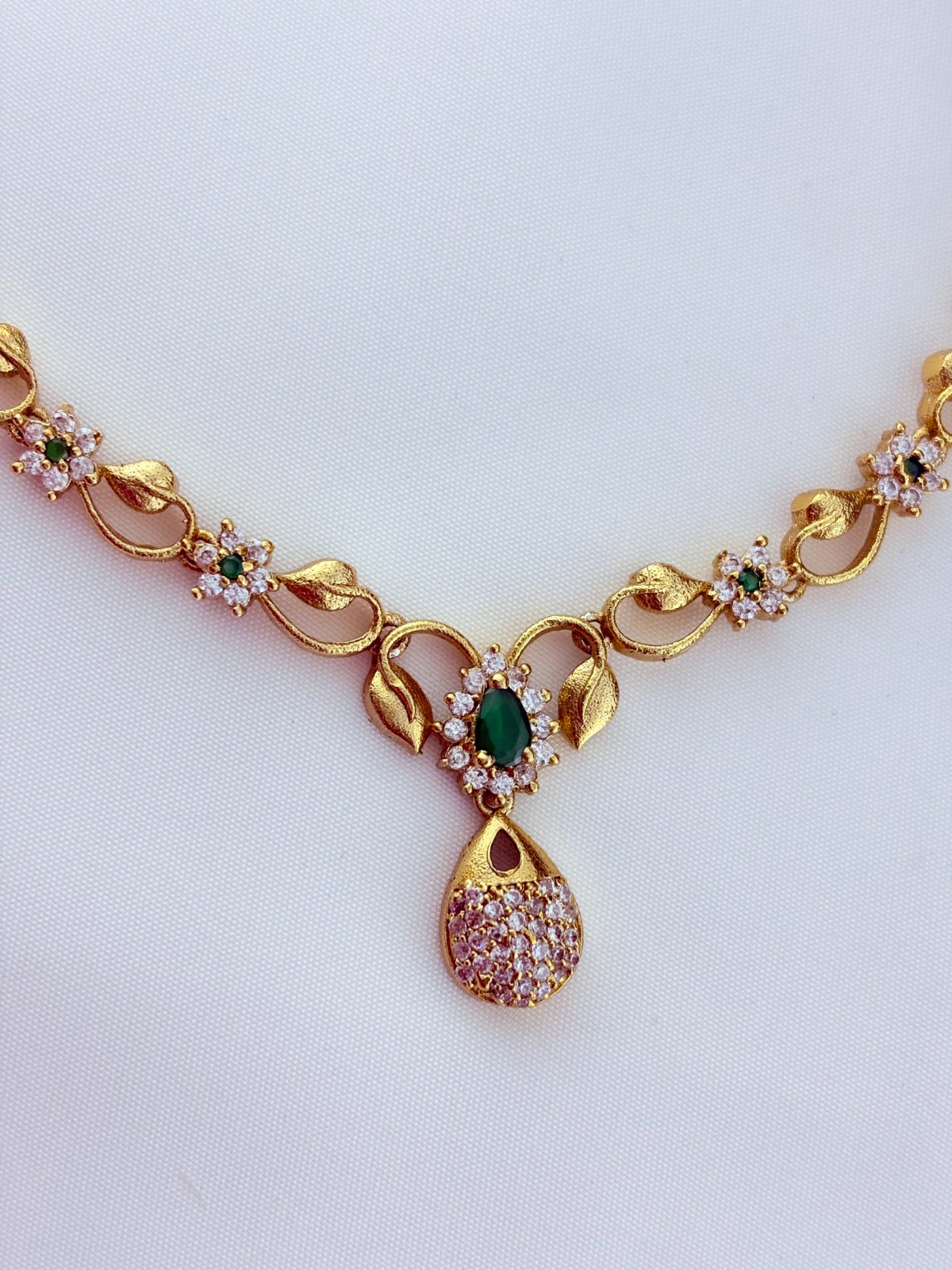 Elegant AD stone necklace in premium matte finish with matching earrings