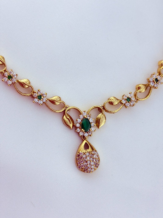 Elegant AD stone necklace in premium matte finish with matching earrings