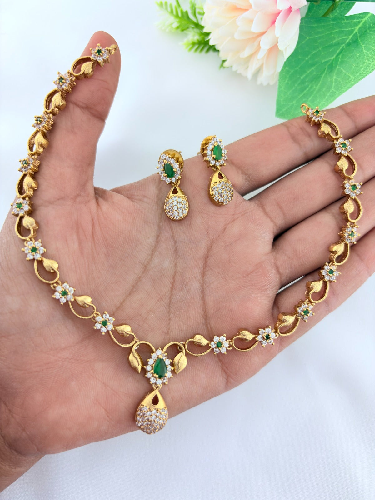 Elegant AD stone necklace in premium matte finish with matching earrings