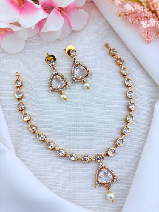 Modern minimalist CZ necklace and earrings enhanced with pearl drops