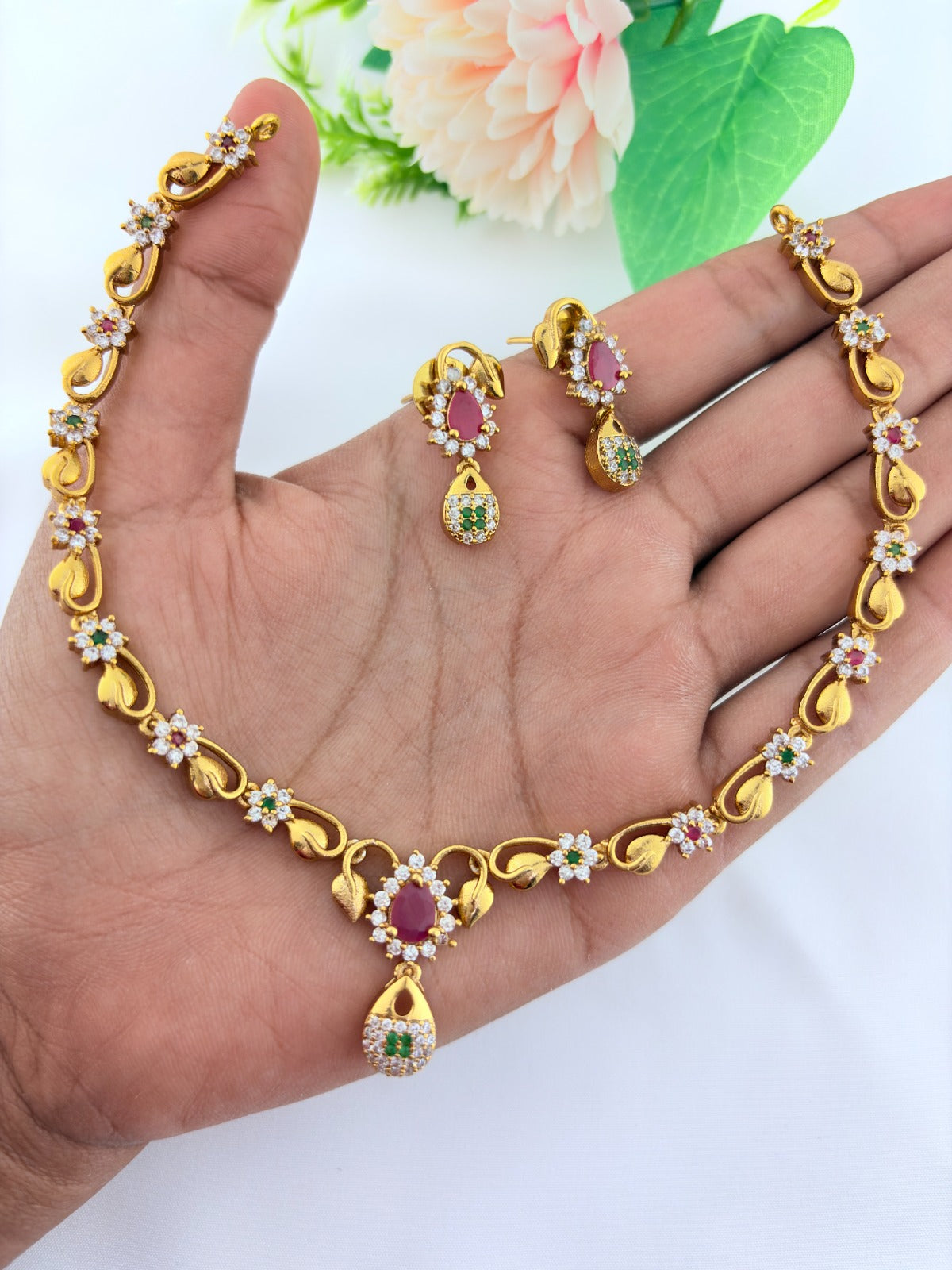 Elegant AD stone necklace in premium matte finish with matching earrings