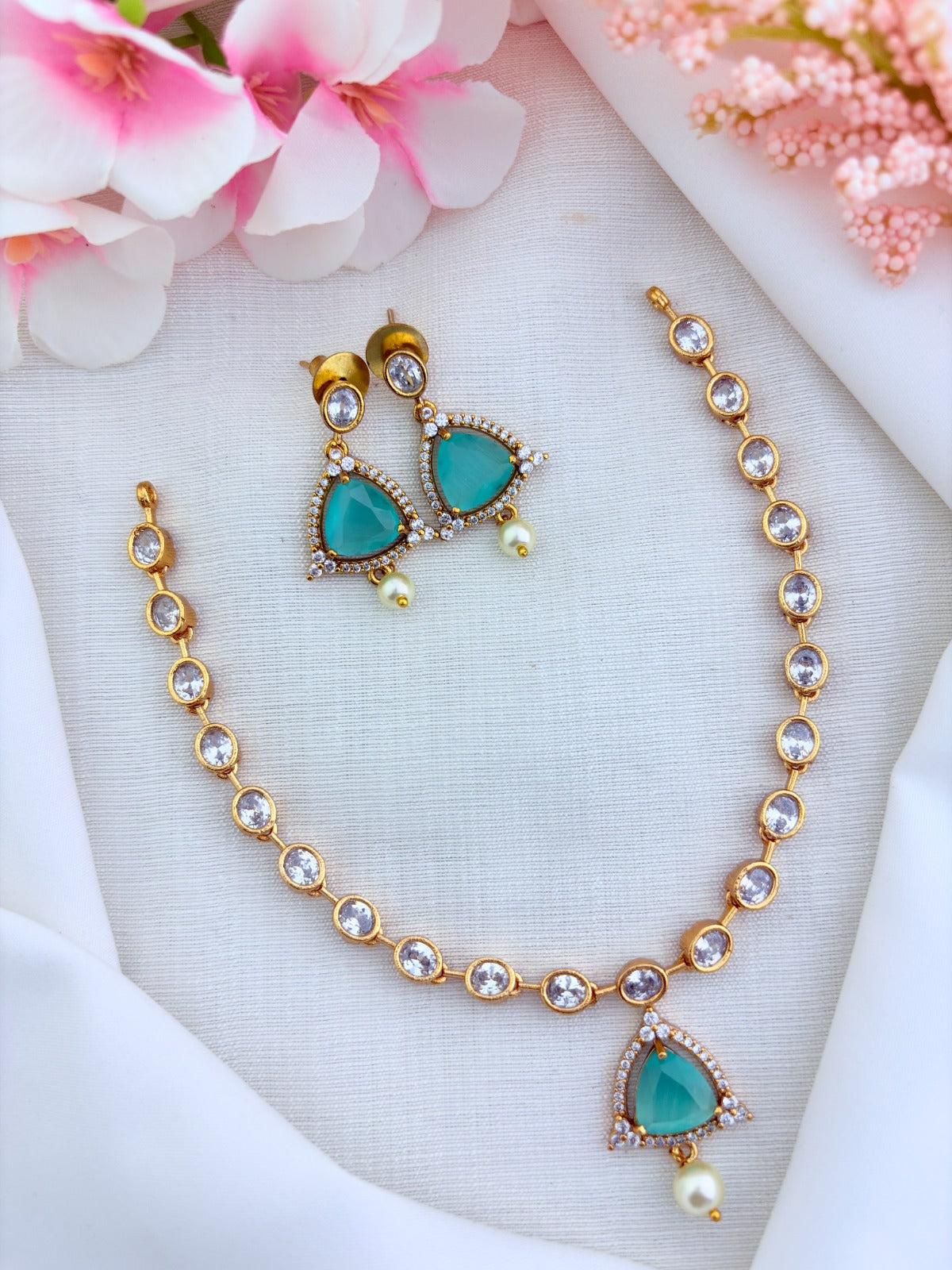 Modern minimalist CZ necklace and earrings enhanced with pearl drops