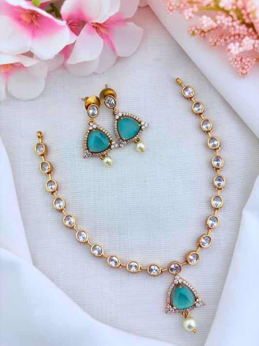 Modern minimalist CZ necklace and earrings enhanced with pearl drops