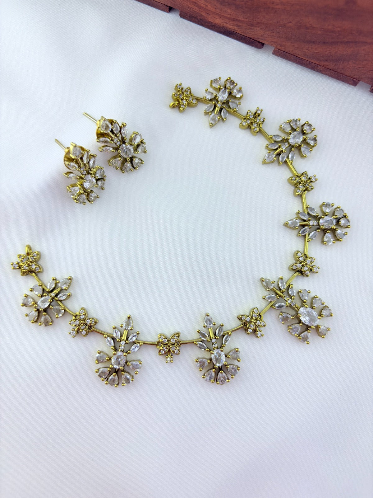 Classic CZ stone necklace and earrings with premium matte texture