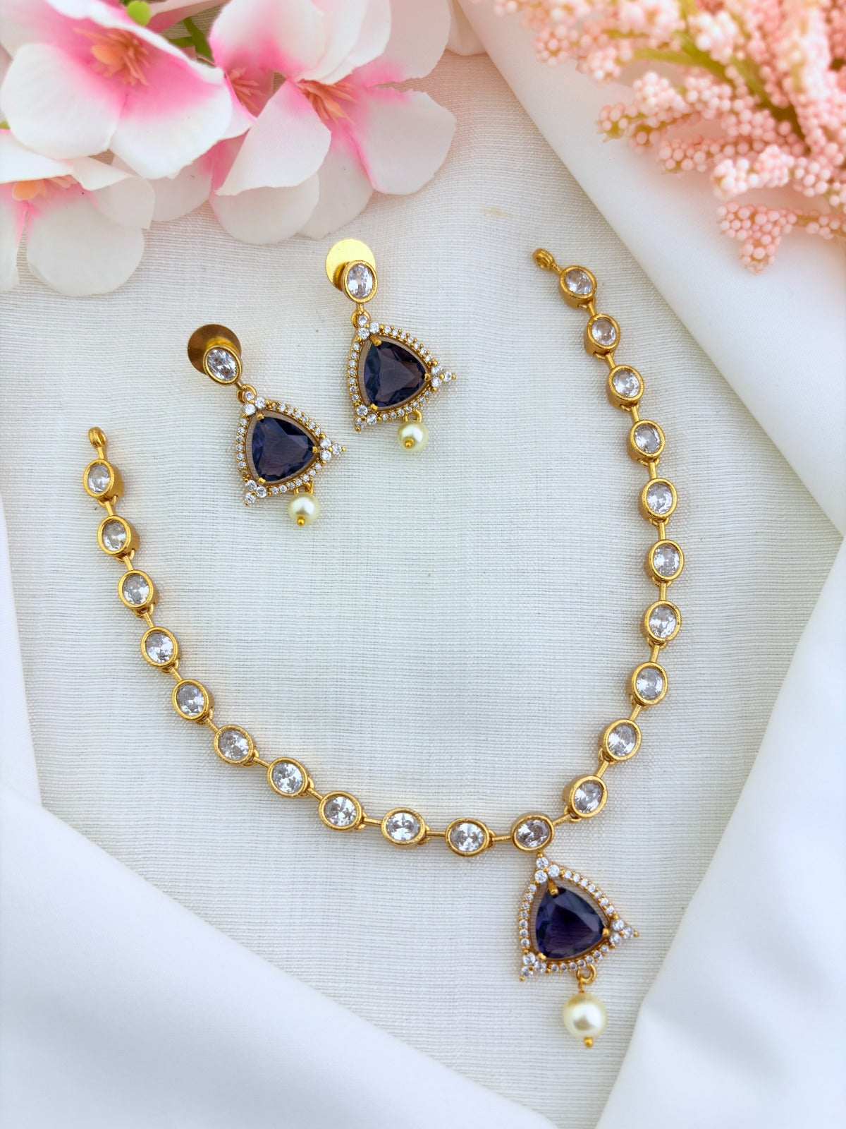 Modern minimalist CZ necklace and earrings enhanced with pearl drops