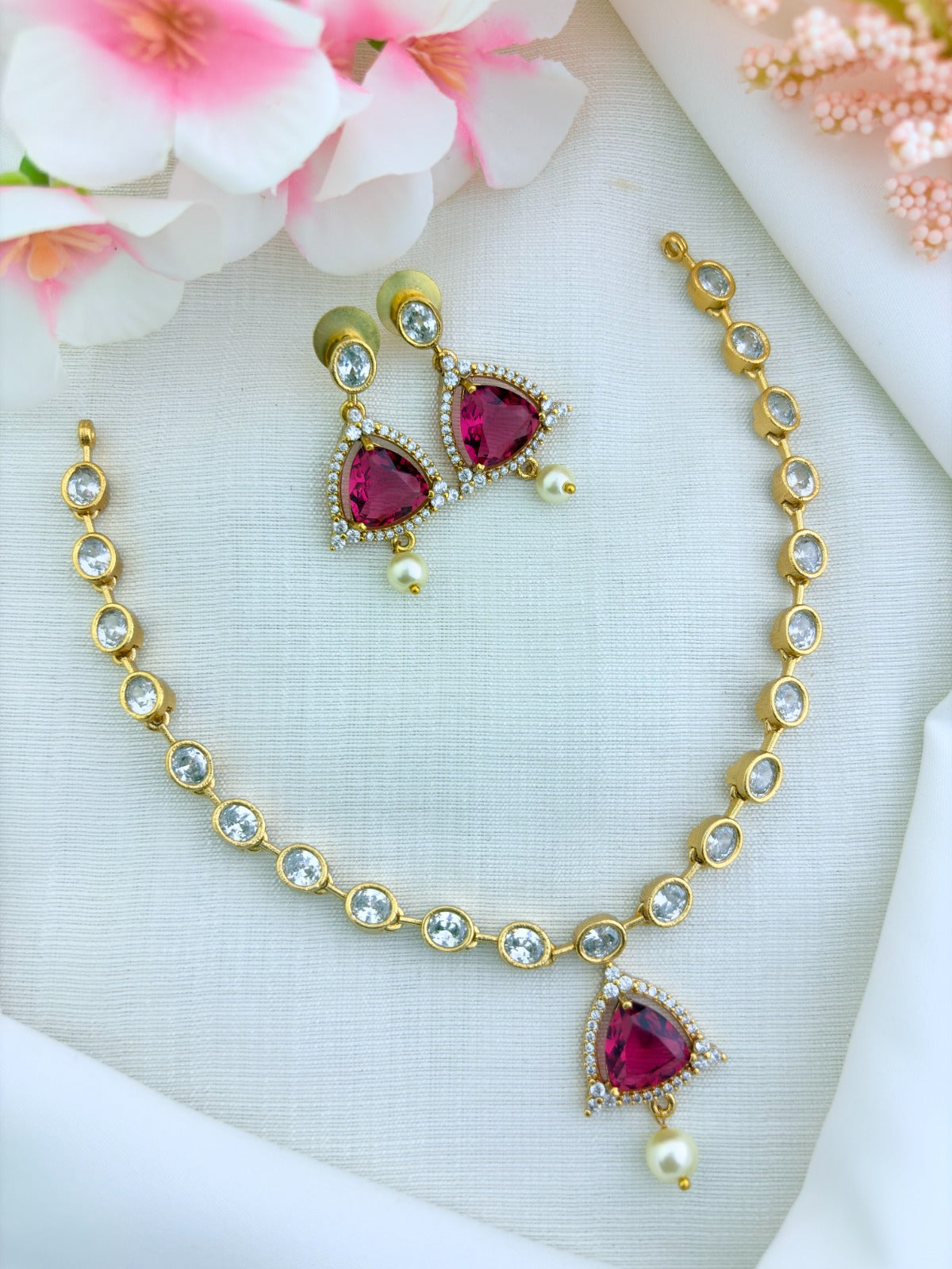 Modern minimalist CZ necklace and earrings enhanced with pearl drops