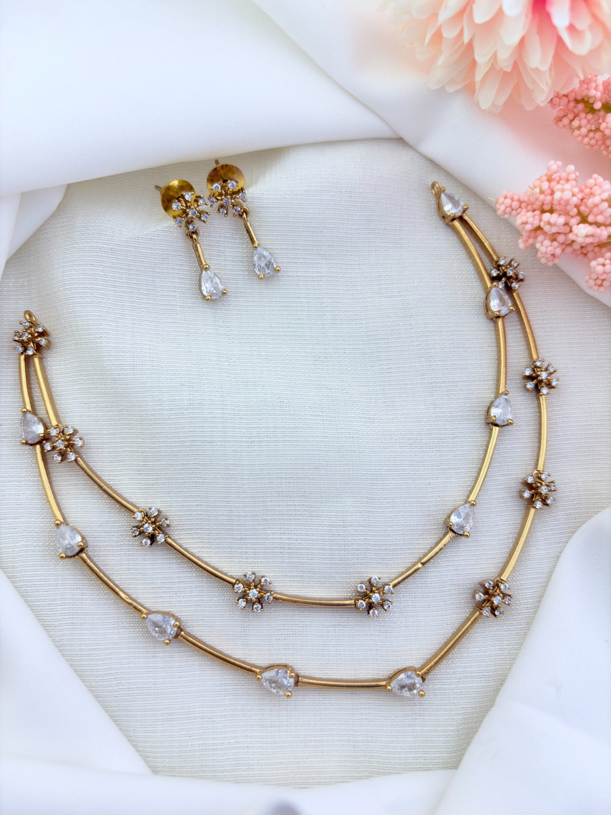 Style in modern elegance -  Premium matte finish two layer necklace and earrings adorned with classic stones